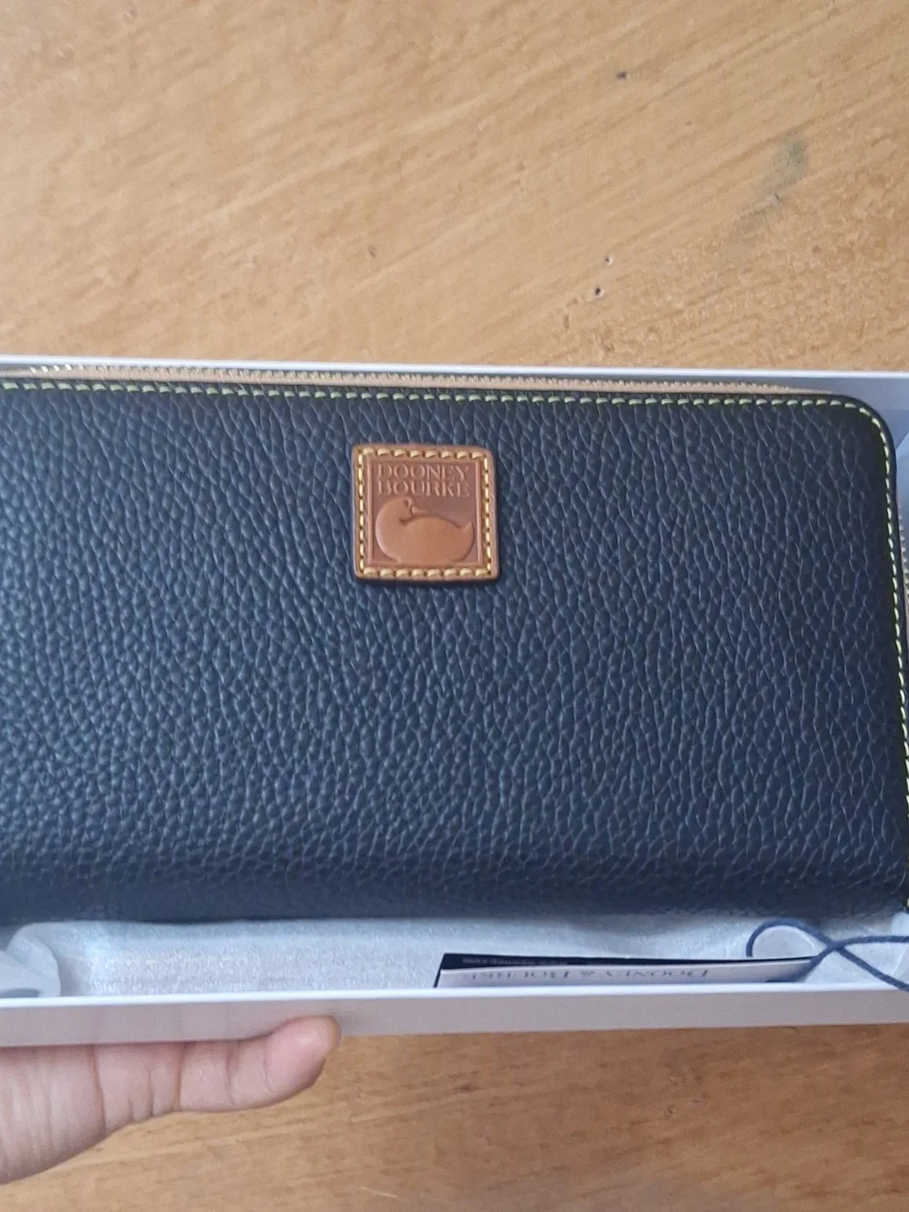 Dooney & Bourke Black Pebbled Zip Wallet with Tan Trim